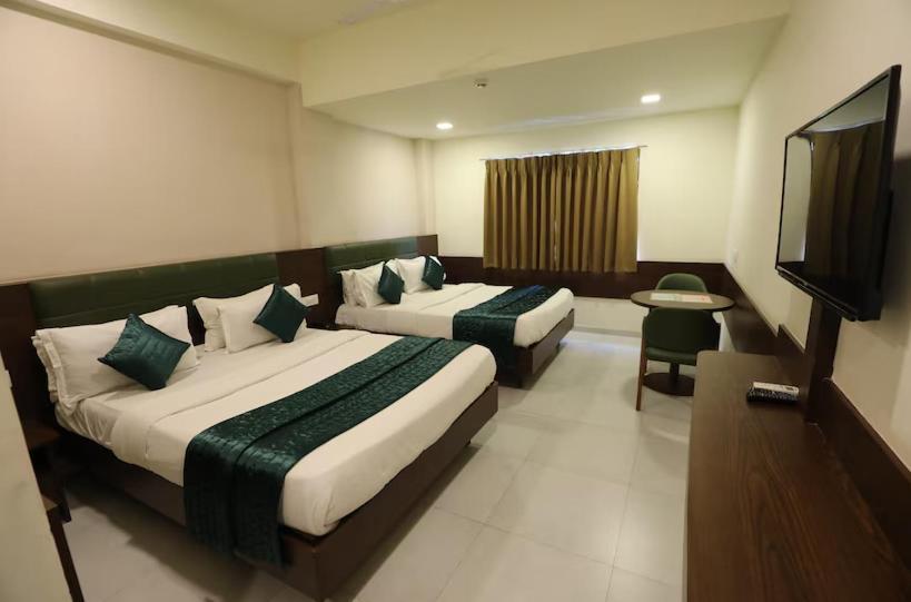 Greenotel Rooms Hazira, Surat Exterior foto